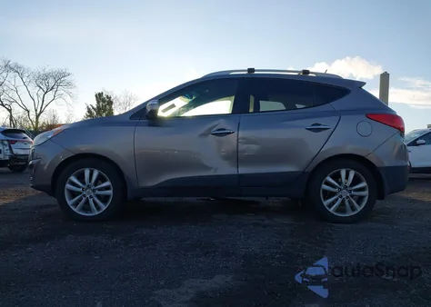 2012 Hyundai Tucson Limited from USA, damaged, VIN KM8JUCAC1CU424895